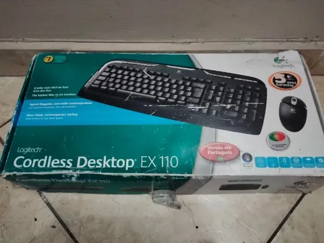 Teclado logitech + Mouse e adapator sem fio na caixa