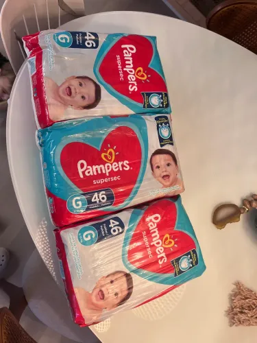3 pacotes de fralda Pampers