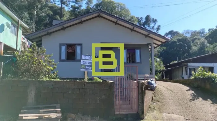 terreno com 2 casa a venda no bairro Martello