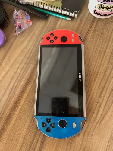 O console portátil KA-5883 - SÓ VENDA - Semi novo 