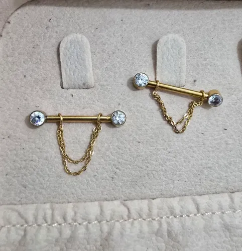 1 par de piercing com corrente ouro mamilo