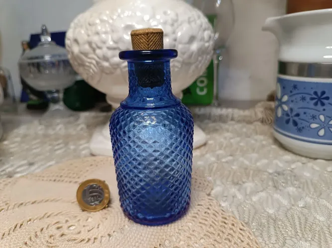 Vidro antigo de perfume da avon