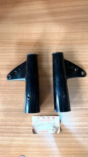 Suporte farol CG 125 1977/78 original HONDA o par