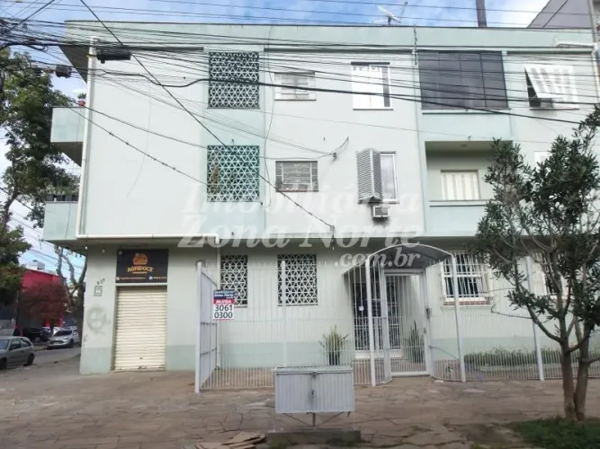 Excelente apartamento 2 dormitórios, sala, cozinha, área de serviço fechada, piso parquet