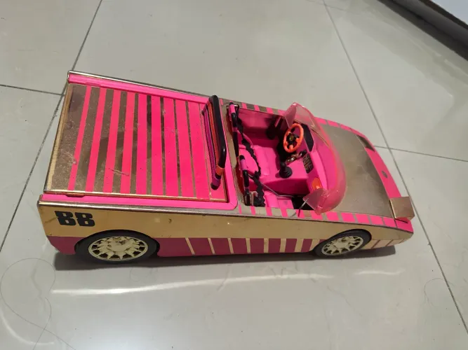 LOL maleta, carro da LOL e helicóptero da Barbie 