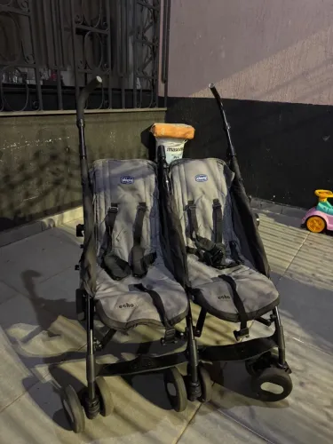 Carrinho de bebe gêmeos