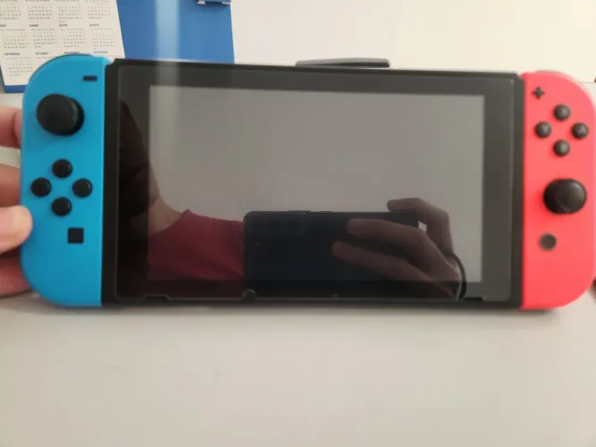 Nintendo switch v2 vendo ou troco por iPhone 