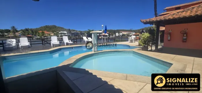 R$560 MIL-Casa à Venda Canal Navegável em Condomínio Fechado Cabo Frio