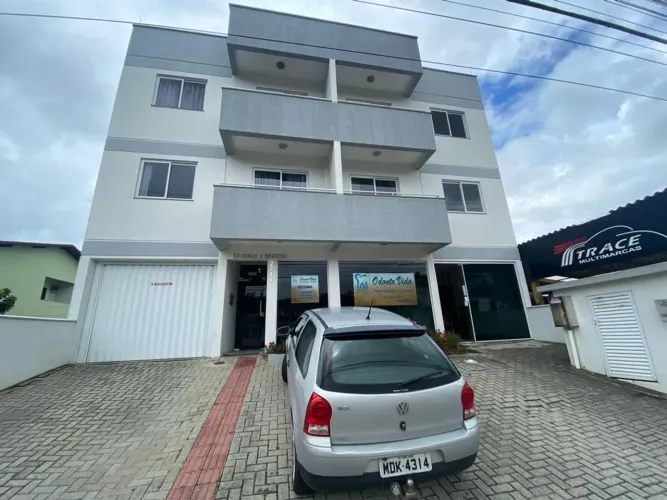 Apartamento com 2 dormitórios para alugar, 58 m² por R$ 1.989,40/mês - Vila Becker - Santo