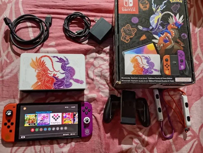 Vendo Nintendo switch OLED edição pokémon desbloqueado completo já com jogos passo cartão 