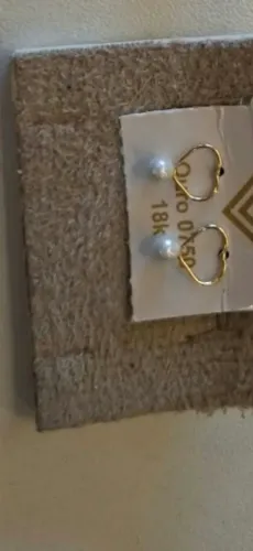 Brinco de coração vazado em ouro 18k