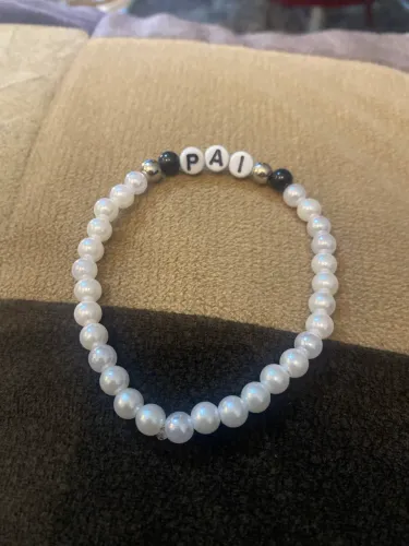 Pulseira de miçanga com o nome pai