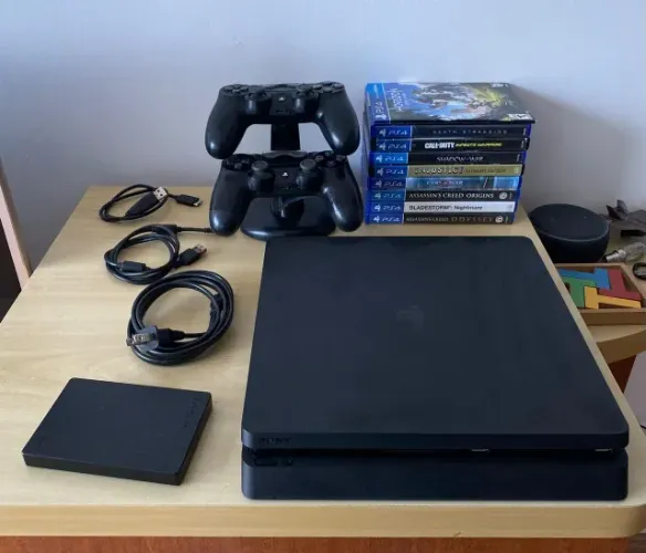 Playstation 4 slim 500gb + 2 controle originais + 10 jogos + hd externo 1tb + stand