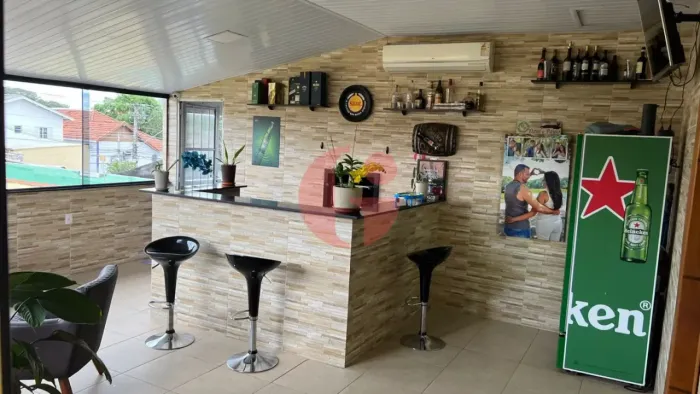 Duas amplas casas e ponto comercial à venda ou locação na Região Central | Jardim Bela Vis
