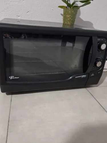 Vendo forno elétrico ficher se tiver interesse chama *