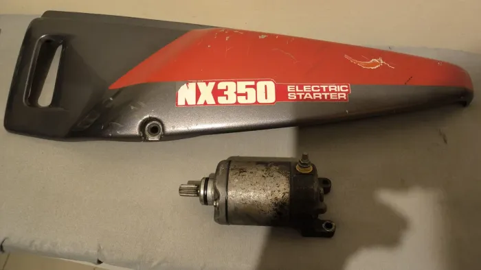 Tampa lateral e motor partida Sahara 350