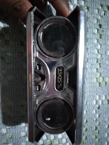 Binóculo de bolso antigo