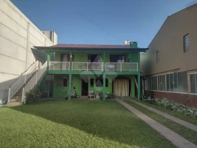 Terreno com duas casas, no Centro - Garopaba/SC