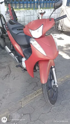 Vendo Honda bis excelente estado vermelha com roda de liga leve. Toda revisada