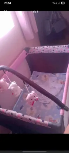 Vendo berço cercado acompanha véu, curvador com urso, regulador de altura ótimo estado
