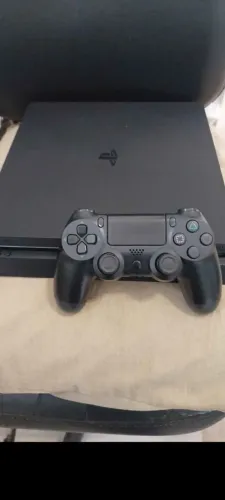 Vendo PS4 slim 500gb completo e ótimo estado.
