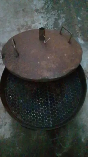 Churrasqueira de bafo com disco de arado