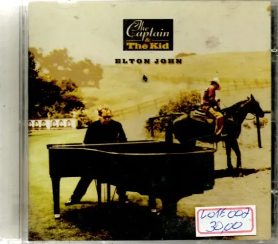 Elton John The Caplain & The Kud