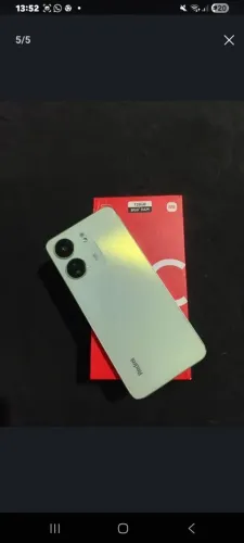 Celular 13c semi novo.,preço negociável 