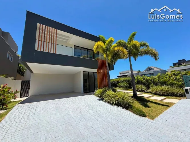 CASA TRIPLEX COM 5 SUITES NO CONDOMÍNIO ALPHAVILLE NA BARRA DA TIJUCA.