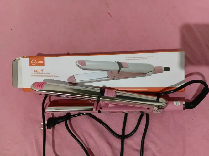 Vendo linda prancha de titânio nova na caixa!