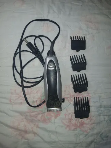 Máquina cortar cabelo "usado quebra galho"
