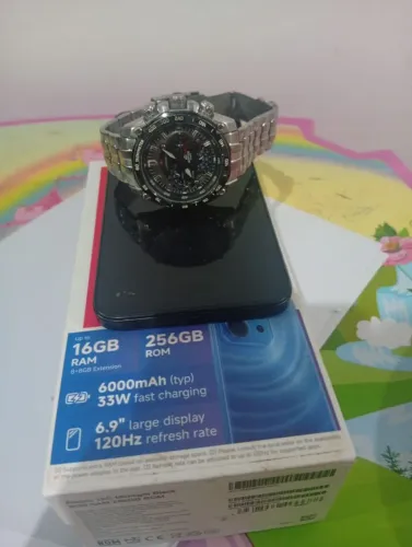 Celular redmi 15 C relógio edifice da cácio troco por um iPhone
