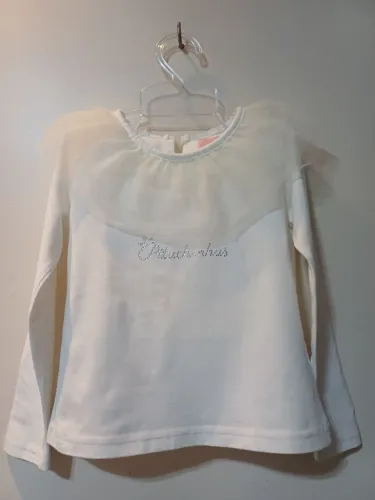 Blusa infantil Pituchinhu's branca, com tule e bordado.