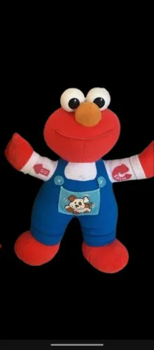 Pelúcia Elmo eletrônico, fala diversas frases, 27 centímetros, importado LINDO 