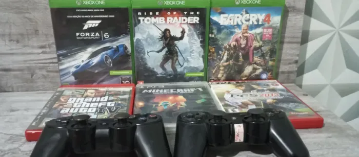 Lote de Jogos e controles Léia a descrição por favor