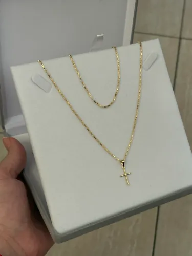 Corrente feita em moeda com banho a ouro