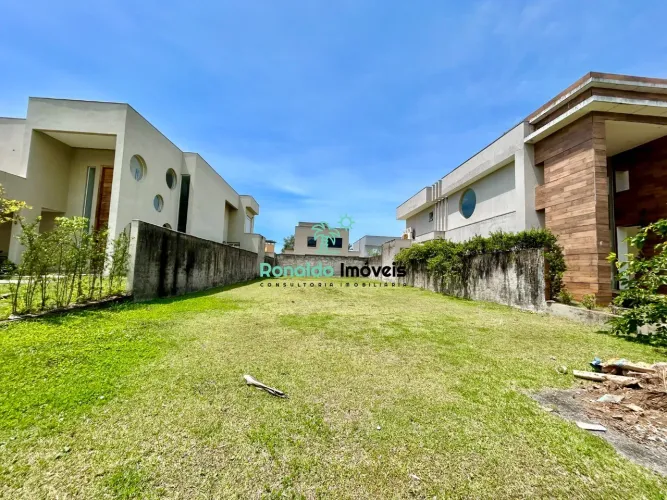 Terreno de 442m² no Condomínio Bougainville em Bertioga-SP: Pronto para Construir a 850m d