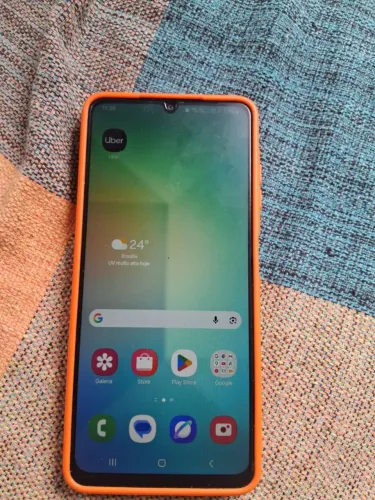 Vendo ou troco um célula A 06 novo