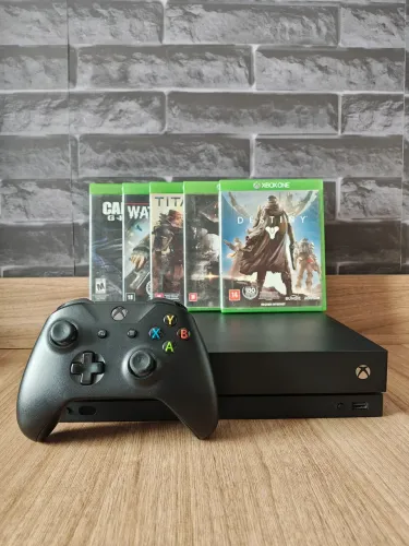 XBOX ONE X 1TB NUNCA ABERTO + MANETE + 1 JOGO A ESCOLHA - O MAIS POTENTE DA CATEGORIA