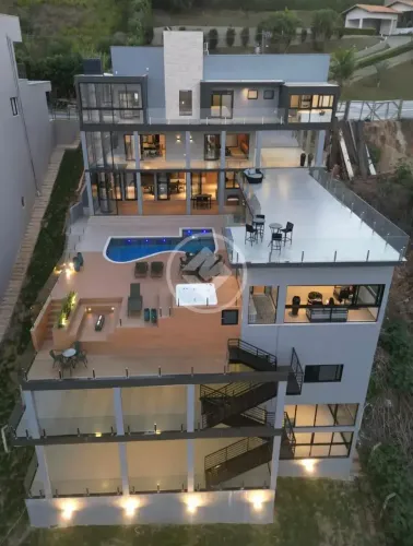 Casa de alto padrão em condomínio à venda  8 quartos (8 suítes) | Escarpas do Lago, Capitó