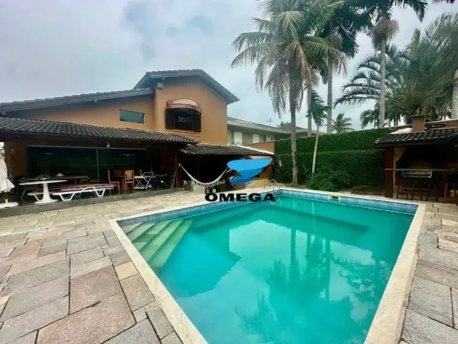 Casa à venda em Condomínio Jardim Acapulco no Guarujá | Omega Imóveis