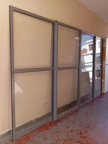 Portas Balcão 4 folhas alumínio cinza nova 3.90 L x 2.12 A.