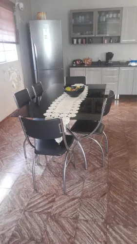 Vendo mesa de vidro preto com 6 cadeiras