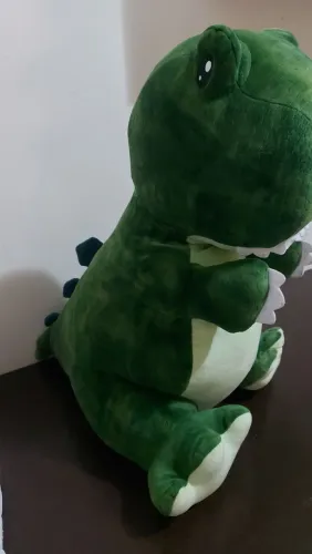 Urso pelúcia dinossauro