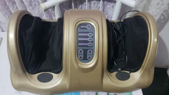 Aparelho de massagem para os pés
