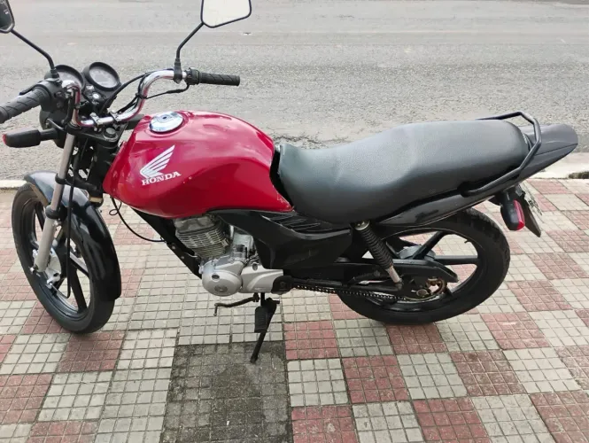 Vendo ou troco Fan 125 atrasada 