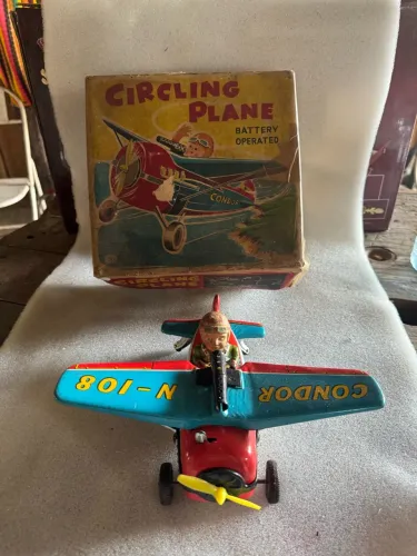 Avião de brinquedo vintage condor de lata anos 1960