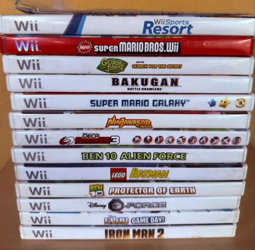 Jogos de Wii + acessórios de esporte