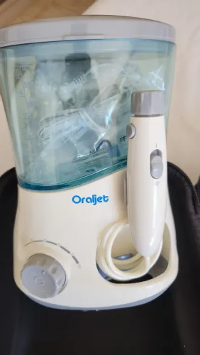 Irrigador oral - marca Oraljet. Novo (nunca utilizado), bivolt, acompanha estojo p/ viagem