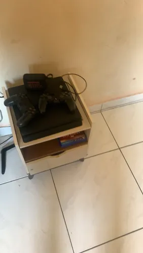 Ps4 slim com 12 jogos seminovo